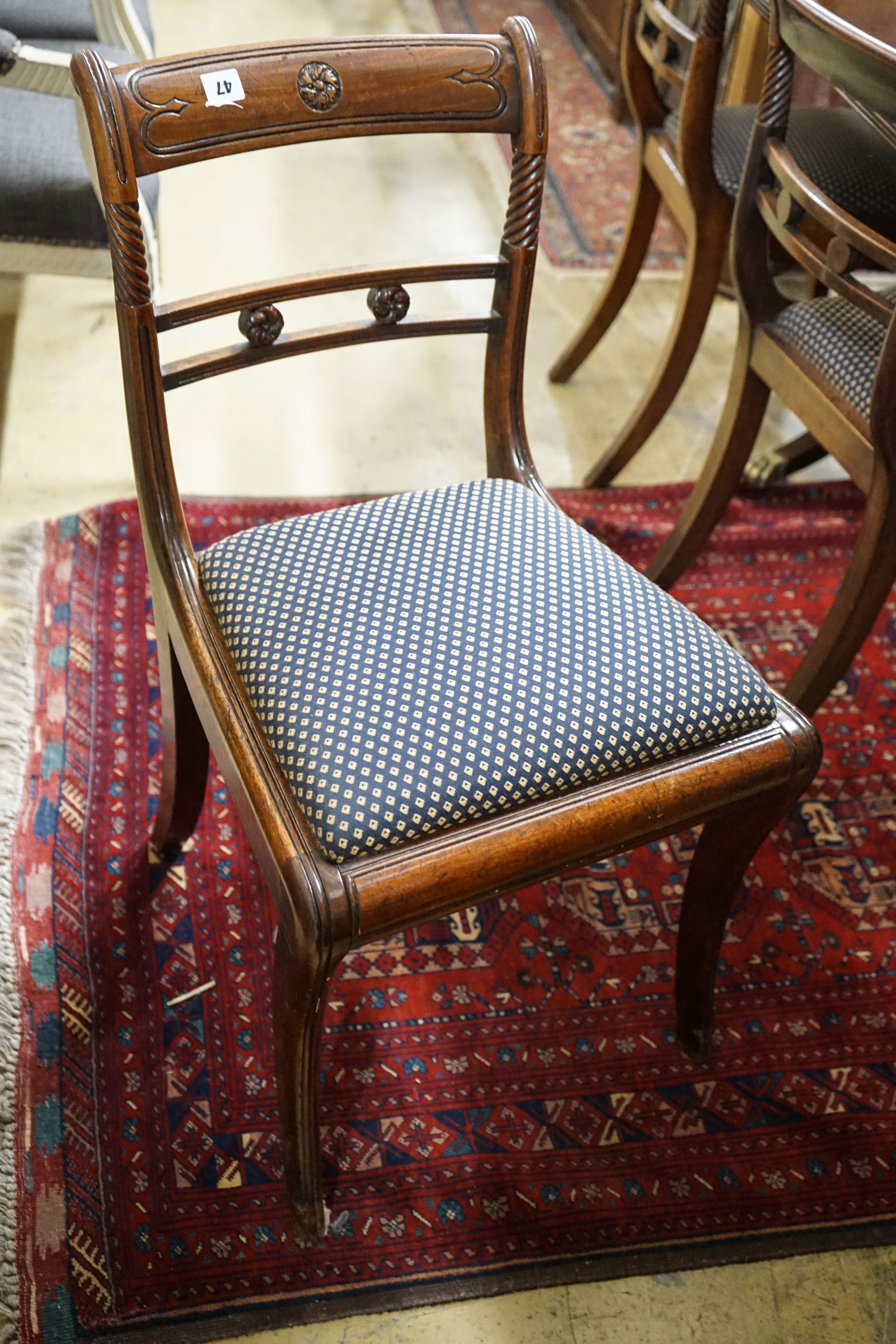 A set of six Regency mahogany dining chairs